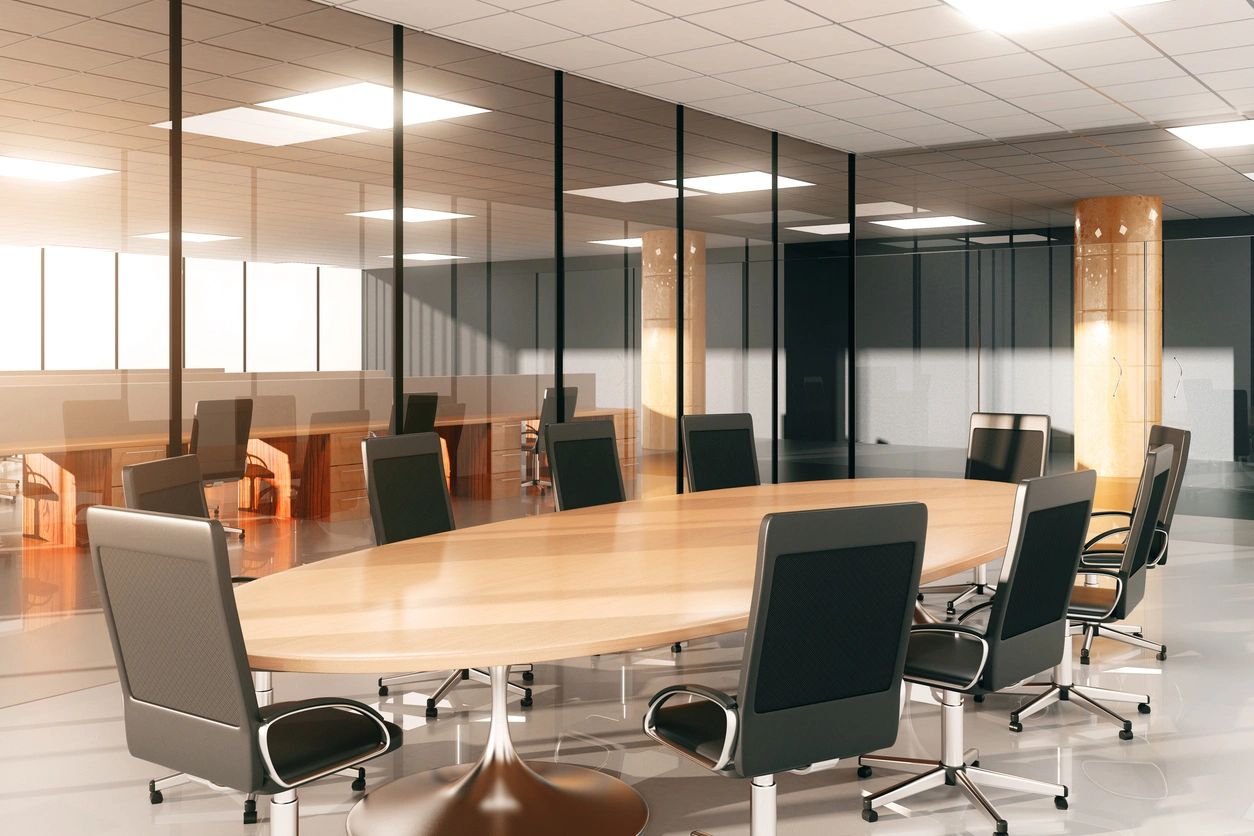 A conference room with chairs and tables in it