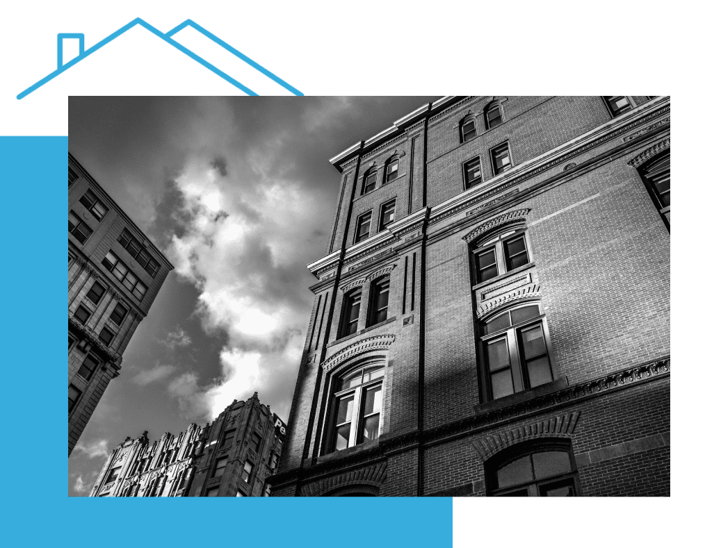 A black and white photo of buildings in the city.